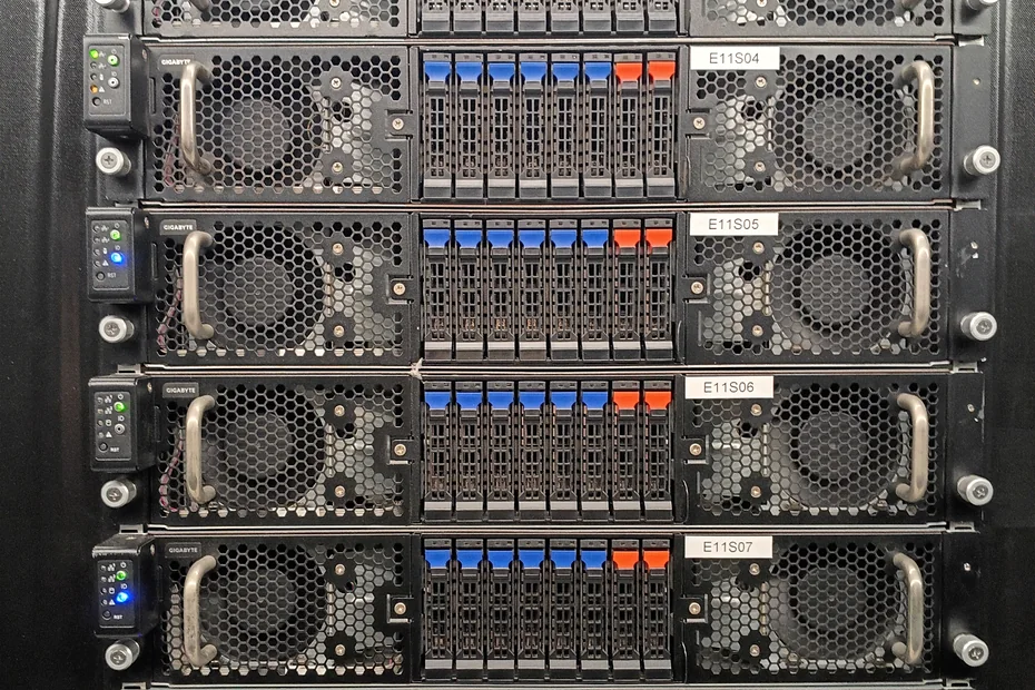 Four Novogara storage servers racked front-on, drive bays populated, status lights green.